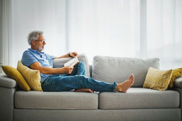 Reading a Book on a Sofa