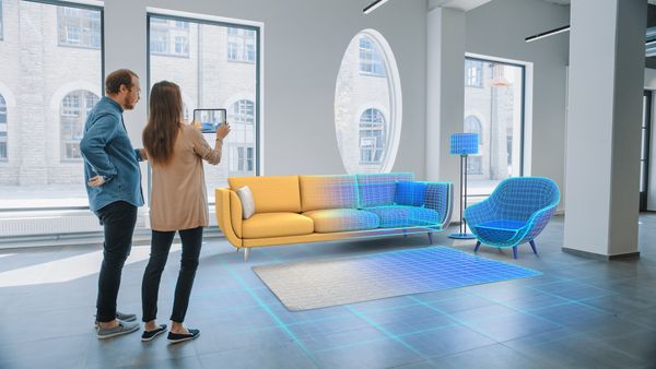 A virtual simulation of a couple designing a space