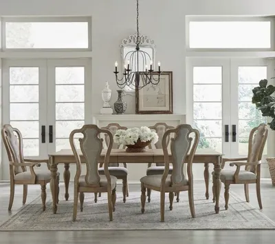 The Liberty Furniture Magnolia Manor dining set in a dining room 