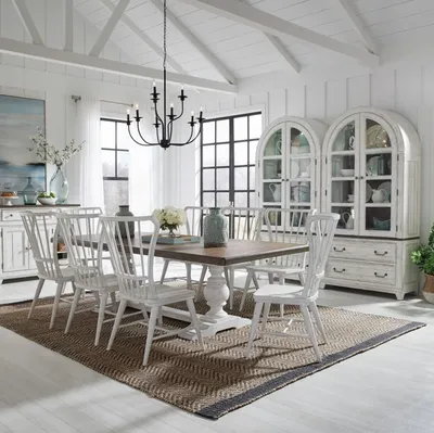 The Liberty Furniture River Place dining set in a dining room 