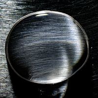 iStock Credit: maraphoto Close-up of a dew drop on a metal surface