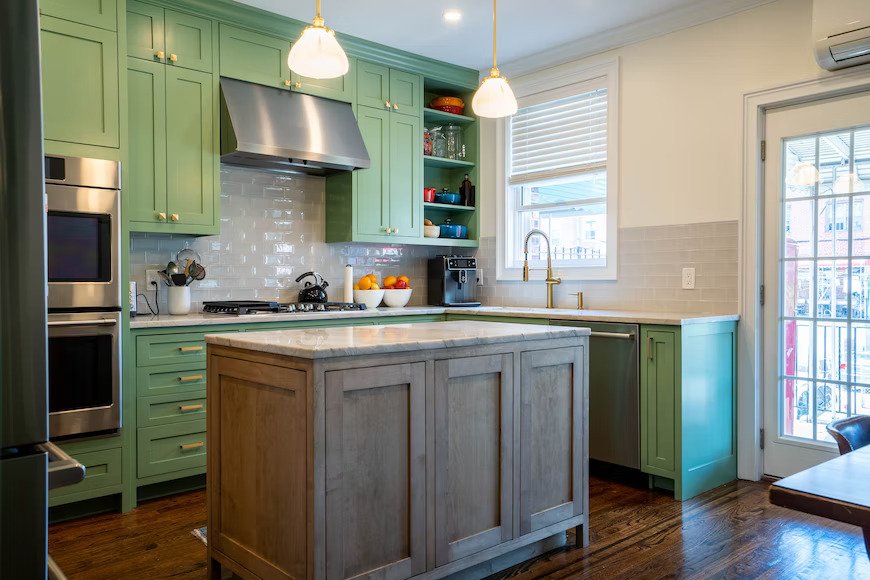 Kitchen with green cabinets