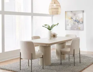 The Modus Furniture Crossroads double pedestal table with décor 
