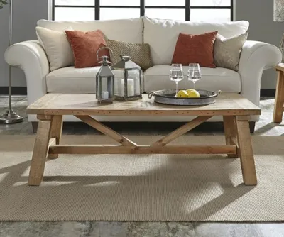 The Modus Furniture Harby coffee table with décor 