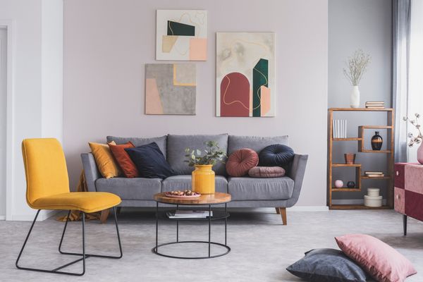 A living room featuring a variety of décor and colors 