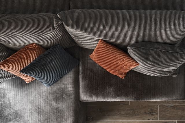 top view of a large grey corduroy sectional