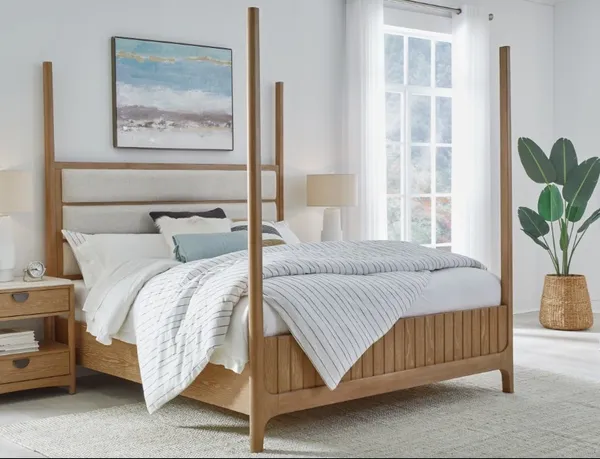 The Parker House Escape poster bed in a bedroom with modern décor 
