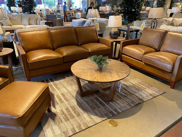 A leather sofa set featured at the Price Point Furniture Nashville showroom 