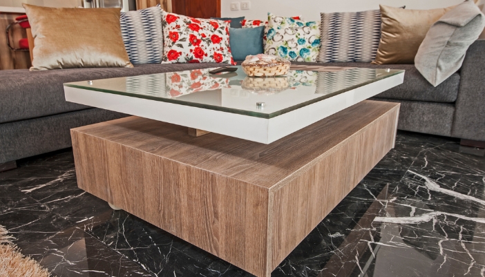 Closeup of living room with storage coffee table and a sectional