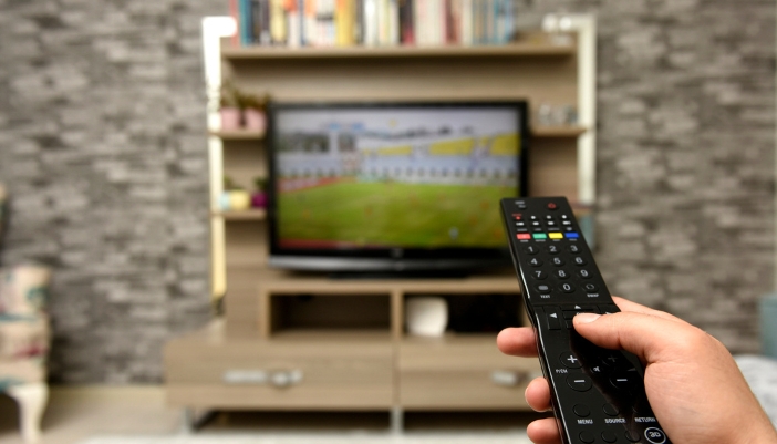 A TV set into a stylish entertainment center ready for game day