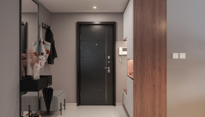 An entryway with a coat rack, bench, and other essentials