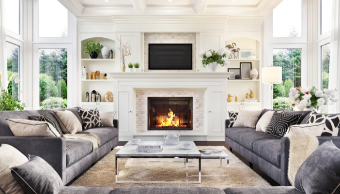 A living room layout with the fireplace as the focal point
