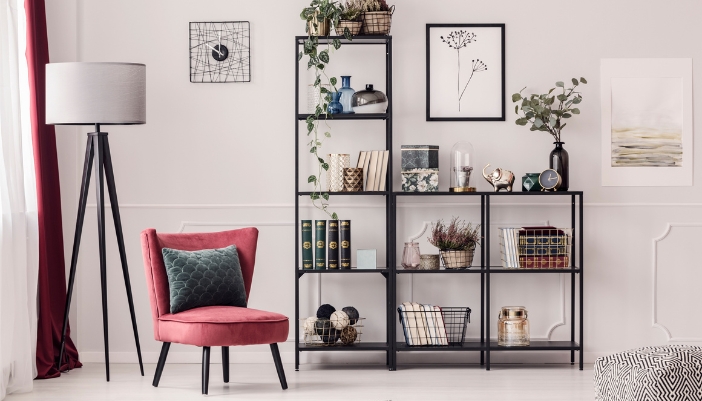 A living space with lots of décor and plants