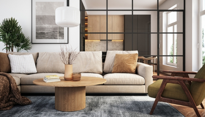 A neutral color sofa sits in a retro but modern living room.