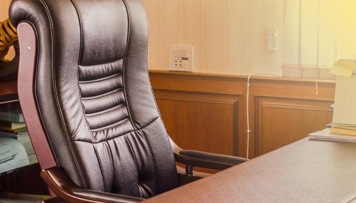 Leather chair in sunlit office