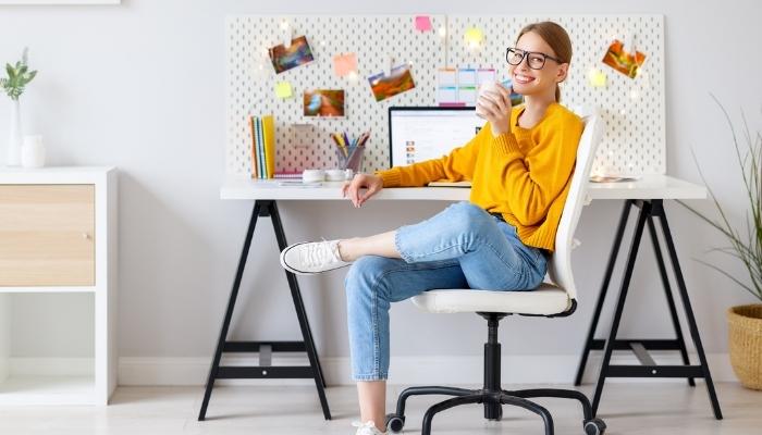 Woman smiling in armless chair