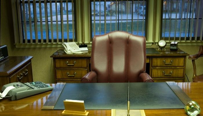 Stylish chair behind desk