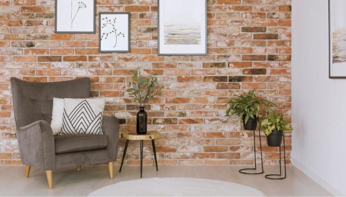 Living room with gallery wall, plants and white accents