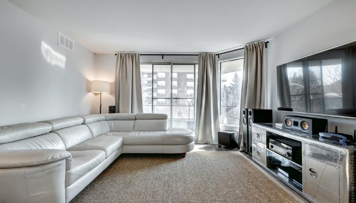 Modern living room sectional facing TV setup