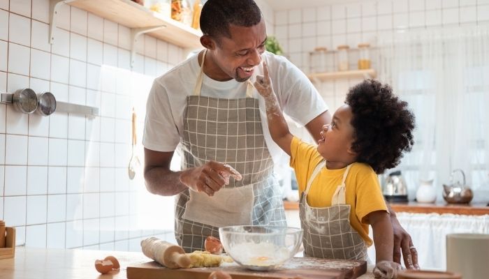 father and son cooking