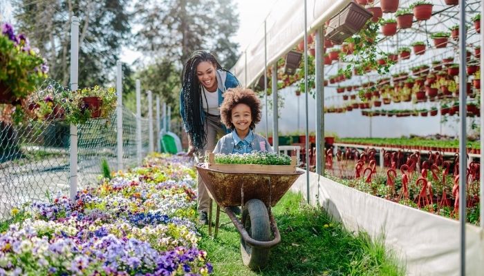 Mother and daughter at plant nursery