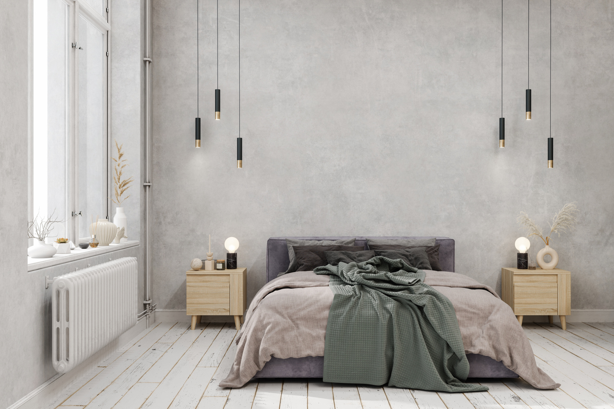 grey room with green throw cover