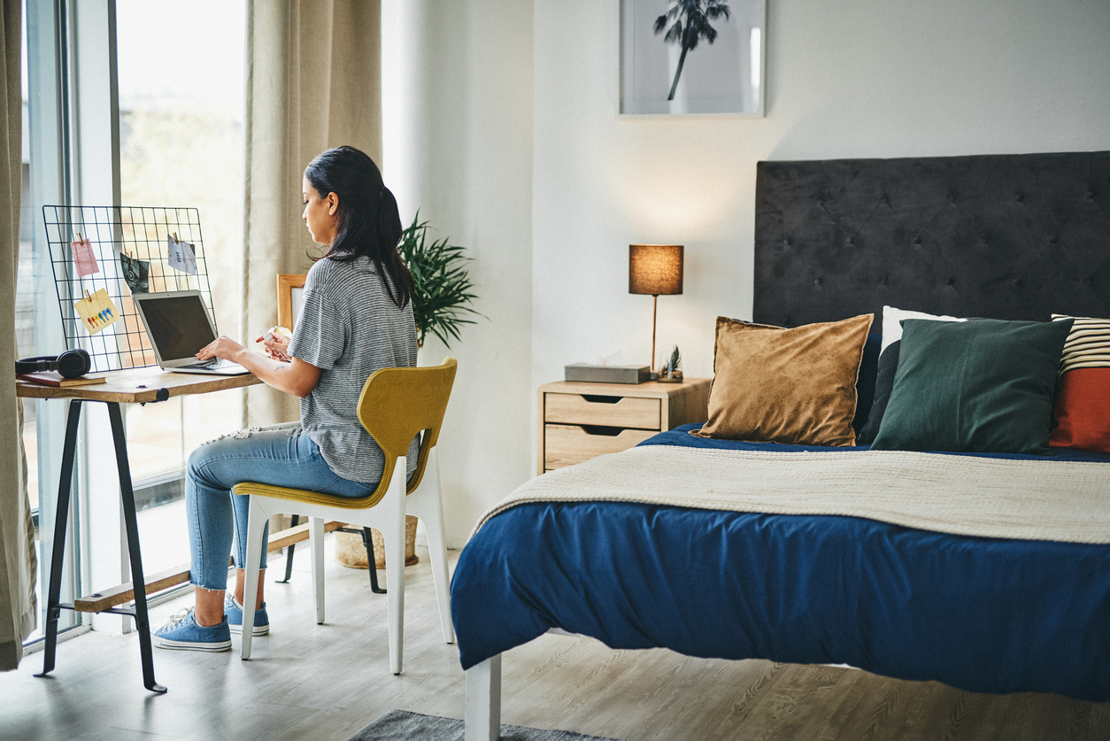 lady working in her spacious bedroom