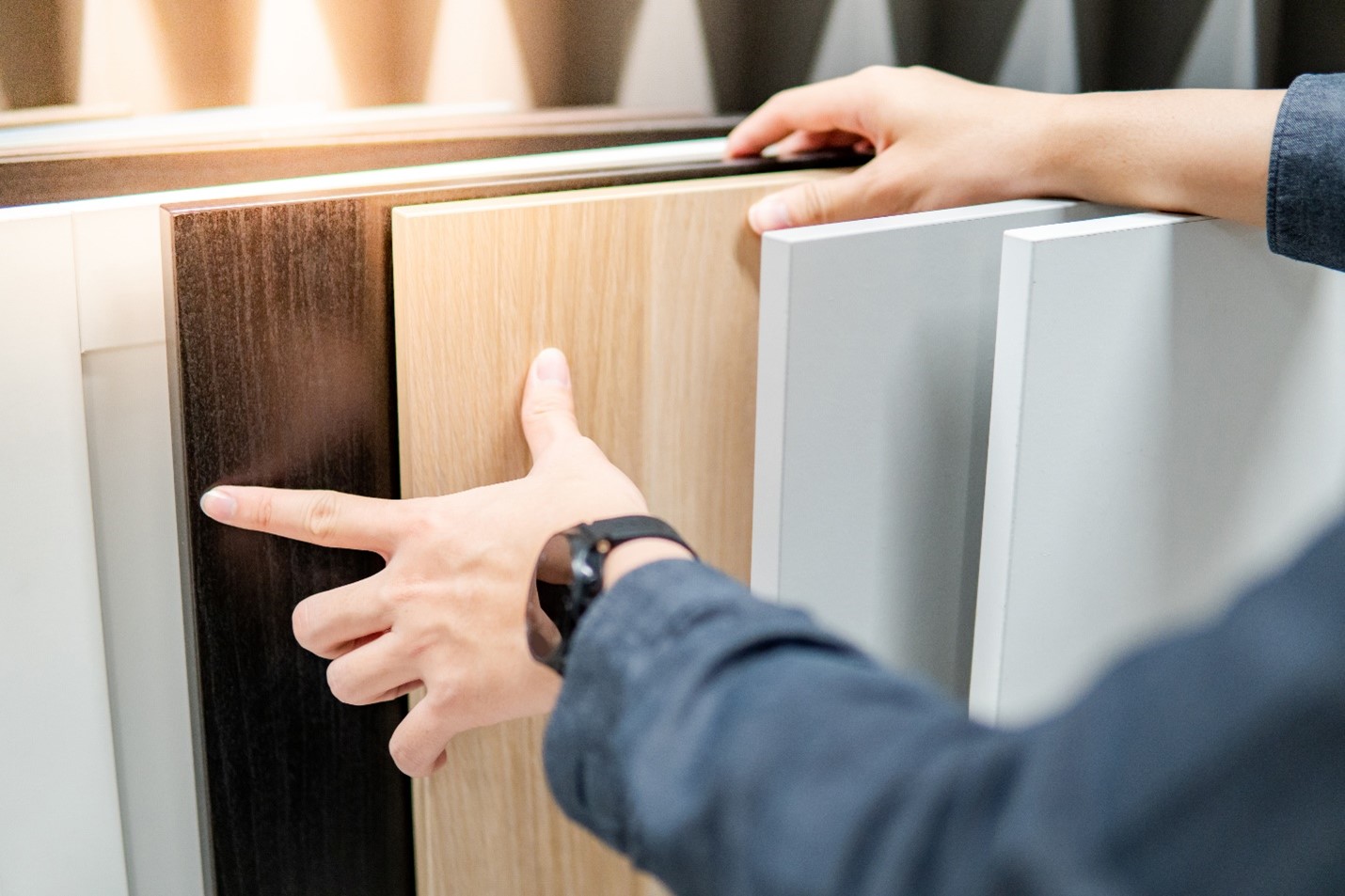 person deciding on various cabinet types