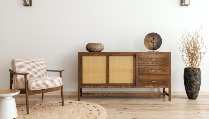 A modern room with wooden furniture and natural accents. 