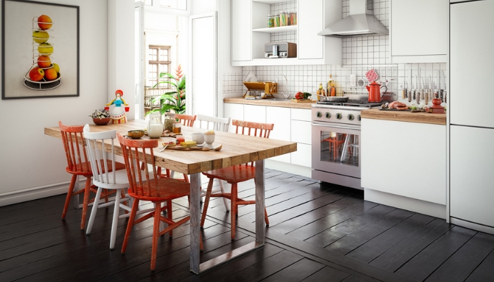 A wooden dining table with mix-and-match chairs in a modern kitchen.
