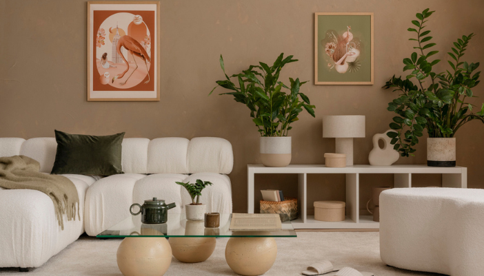 A neutral color living room with bubble furniture and warm accents.