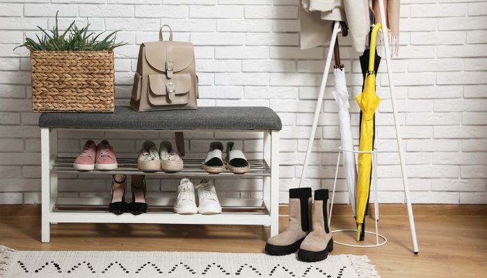 An entryway bench with a built-in shoe rack