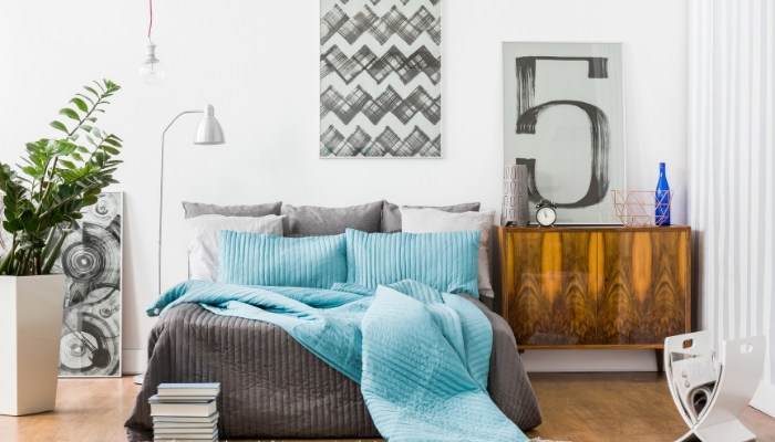 Mixed bedroom with bed as the focal point