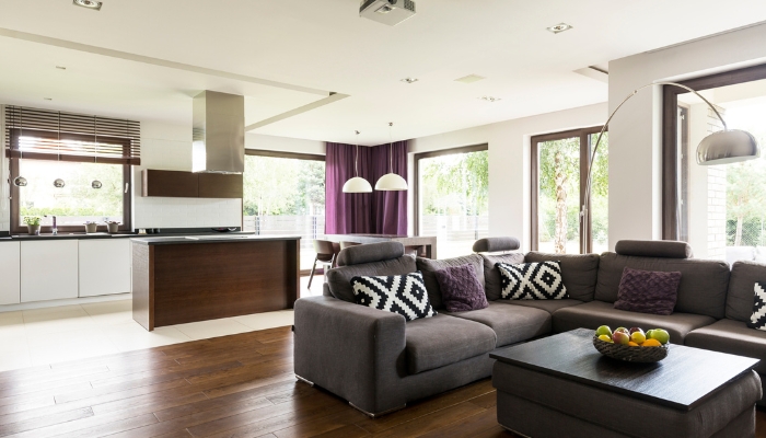Open concept home with repeating purple color
