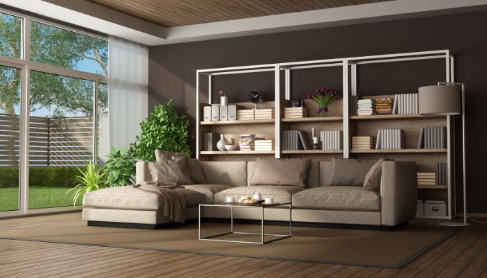 A spacious living room with an extensive metal and wood bookcase