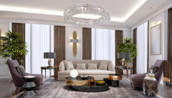 A living room with the focal point spotlighted by the light fixture