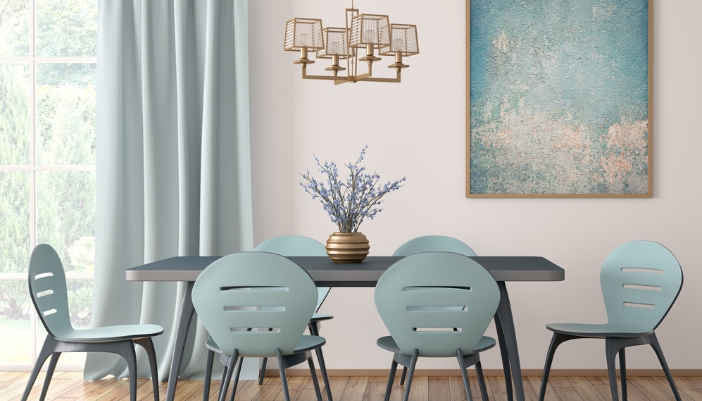 A neutral dining space with a piece of artwork as the focal point