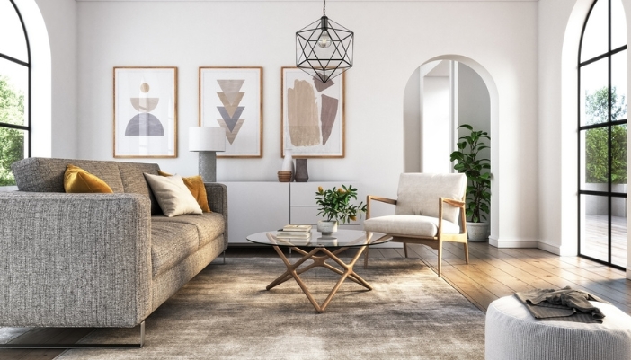 A neutral color living room with geometic and wood accents.