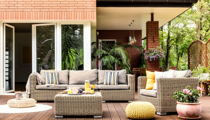 A comfy patio with cushy furniture