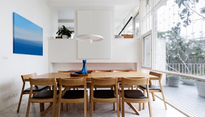 Dining room next to huge windows
