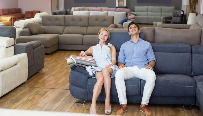 couple choosing new sofa