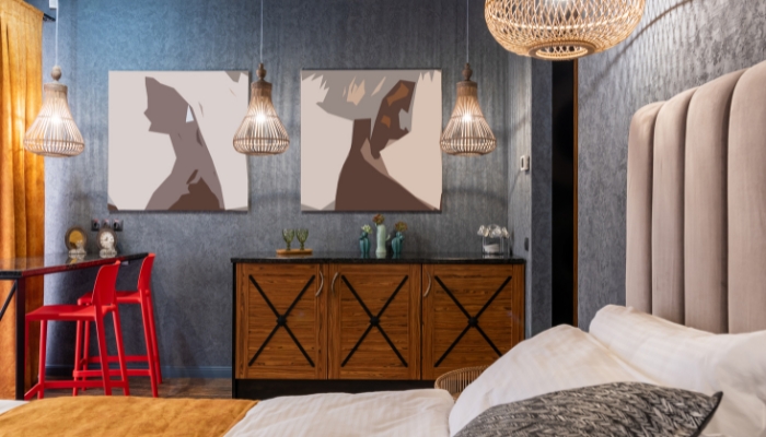 Bedroom with tasteful art on the walls