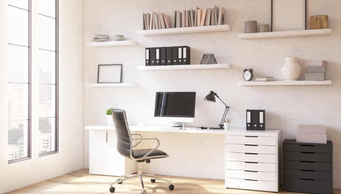 Home office with filing cabinets and floating shelves