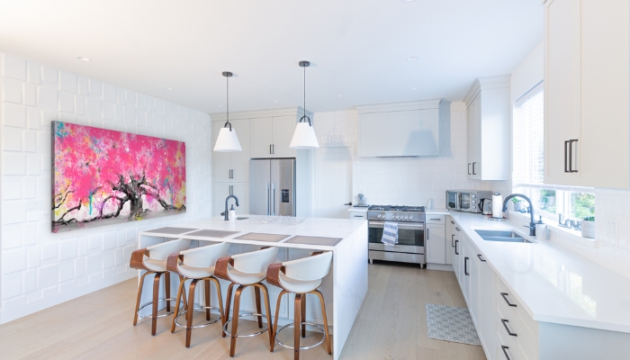 Dining area with large, beautiful piece of art