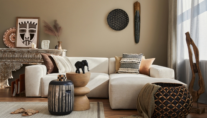 An African-inspired living room with ethnic sculptures