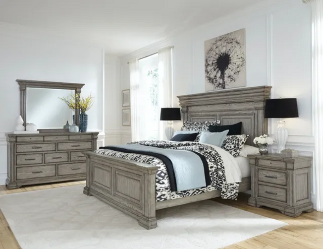 front view of a transitional bedroom with matching beige transitional wooden fruntiure