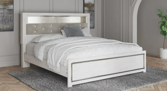 front view of a modern glam bedroom with a white king bed
