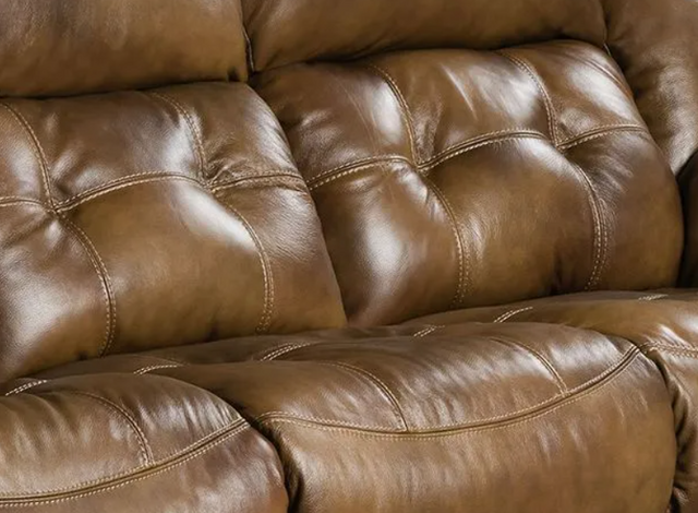 front close view of a brown genuine leather sofa