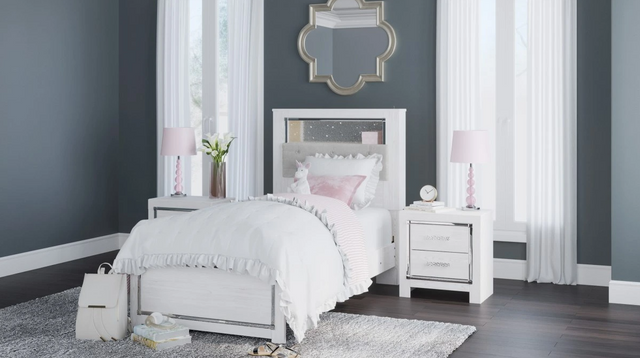 front view of a modern children's bedroom with white glam furniture including a twin bed and a matching side table