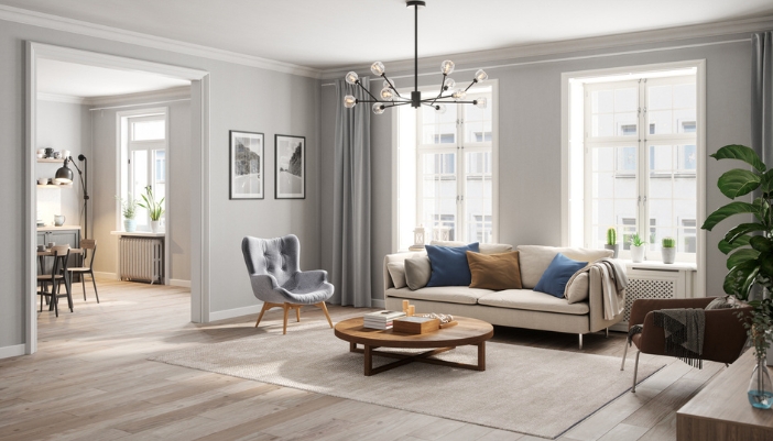 A low-standing wooden coffee table rests in a cozy, modern living room.